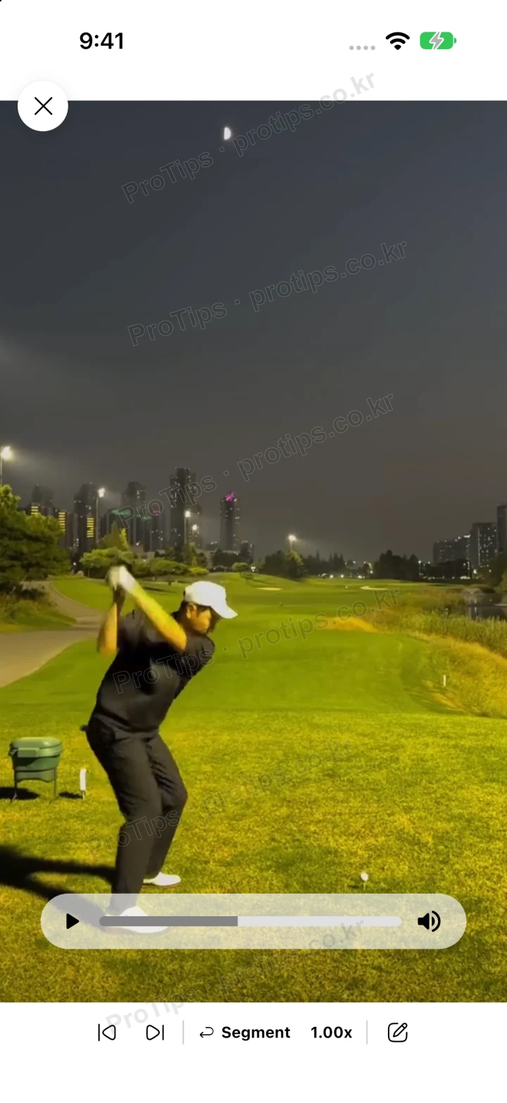 ProTips video screen playing a driver tee shot at a night range